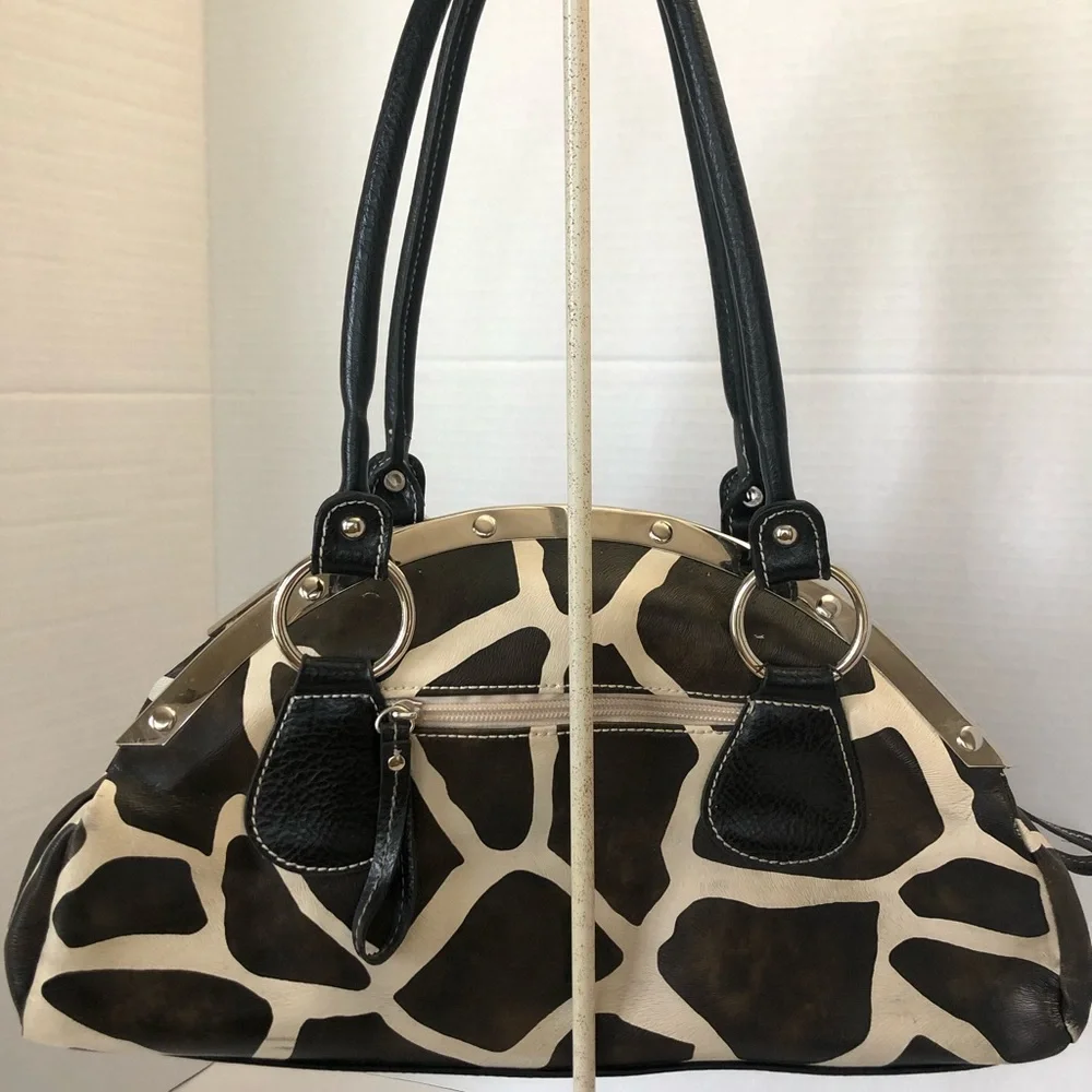 Giraffe print faux leather satchel